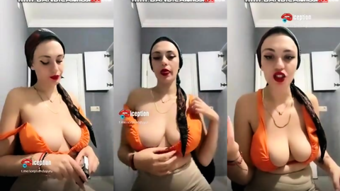 Türbanlı Lames sigara içip göğüslerini sergiliyor webcamde