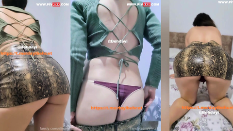 Elinaex tangasını gösterip eteğini indiriyor, seksi kalçalarla azdırıyor
