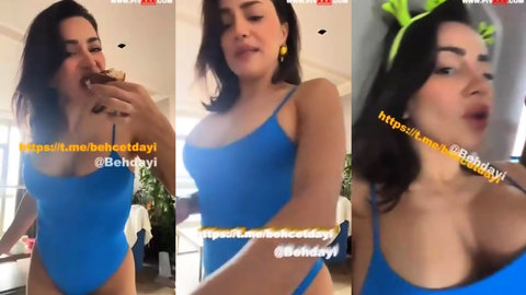 Serpil Cansız mavi bodysuitte kek yiyip içki içerek şov yapıyor