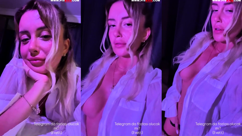 şeyma çiftçi onlyfans videosunda gömleğini açıp memelerini gösteriyor