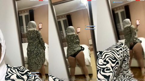 mayamartinni onlyfans videosunda türbanlı halde kalçalarını açıyor