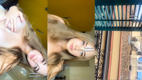 mayamartinni onlyfans videosunda göğüslerini açıp balkonda dışarıyı izliyor