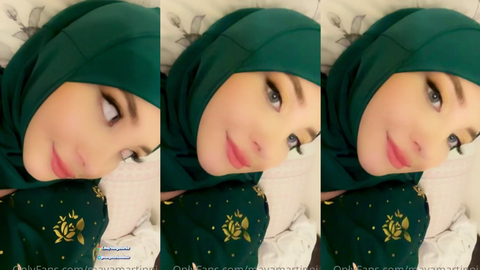 mayamartinni türbanlı seksi pozlarla yatakta yatıyor gülümsüyor