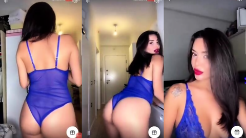 ada kumsal tangoda mavi bodysuitle poz verip götünü gösteriyor