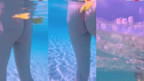 heraandposeidon su altında çiçekli bikinisini açıp kalçasını gösterdi