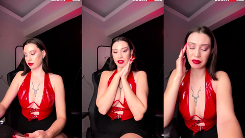 tango helen kırmızı latekste poz verip gülümsüyor